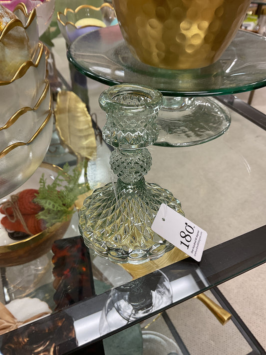 180° Degrees clear textured glass candle holder with geometric cut pattern and brass base, close-up detail