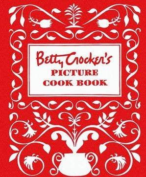 Betty Crocker's Picture Cook Book cover with red background and ornate white decorative flourishes