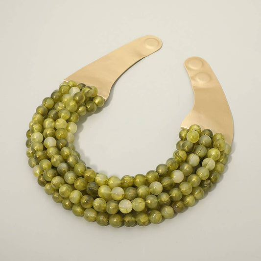 Sensibling Corp. marbled ball beaded magnetic collar necklace with olive-green beads and cream faux leather, curved display