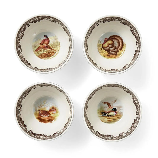 Four Spode Woodland dip bowls with wildlife illustrations and brown borders, overhead view