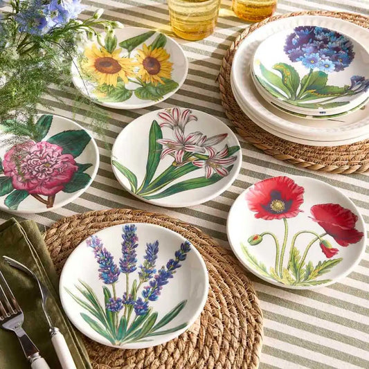 Portmeirion Bloom Garden Side Plates with colorful botanical flowers styled on striped table with fresh flowers