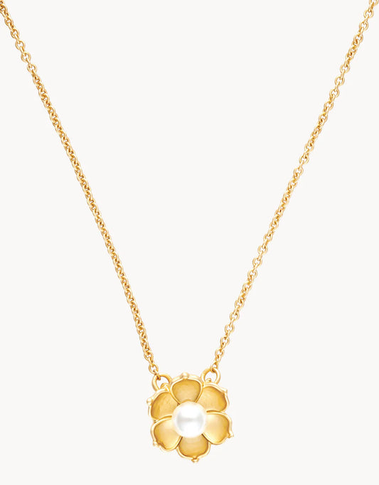 Introducing the Spartina Sea La Vie Bloom Necklace by Spartina—a gracefully delicate gold necklace featuring a flower-shaped pendant. Inspired by magnolia necklaces and designed as inspirational jewelry, this pendant showcases radiant gold petals surrounding a single white pearl at its center, capturing the essence of timeless elegance.