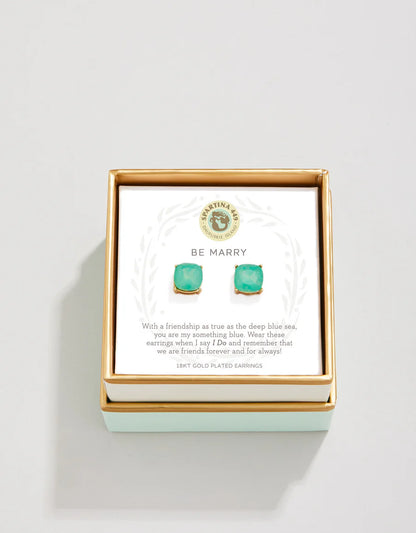A pair of Spartina Sea La Vie Sea Glass Stud Earrings by Spartina are displayed in an open jewelry box with a card that reads, "BE MARRY," featuring a friendship message and gold accents—perfect as something blue for your special day.