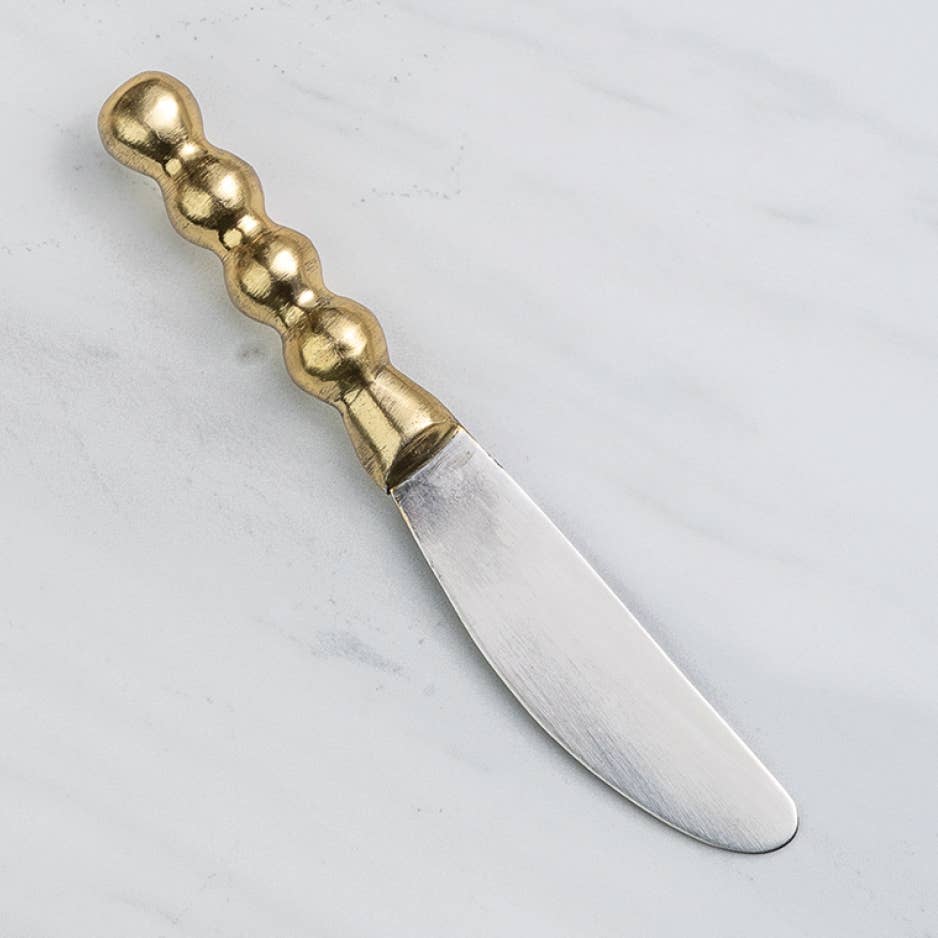 India Handicrafts Inc Gilded Beaded Spreader with gold beaded handle and white blade