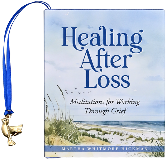 Healing After Loss mini book by Martha Whitmore Hickman with light blue cover featuring beach grass and ocean, blue ribbon bookmark with gold charm