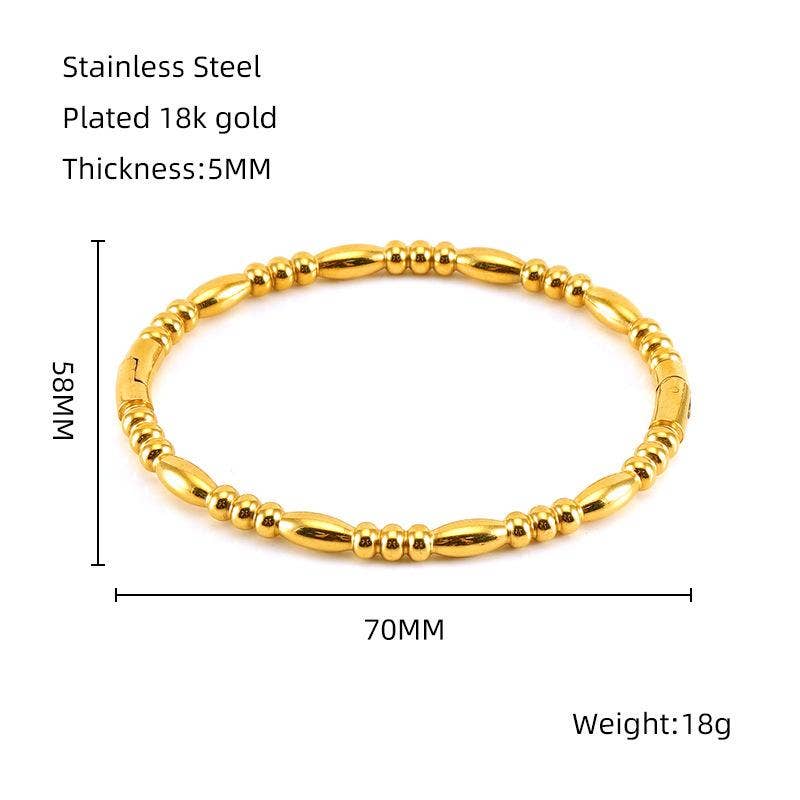 The Mio Queena - Multi-style 18K Gold-plated Stainless Steel Bangle - FGS by Mio Queena features a beaded gold-tone stainless steel design, making it an elegant addition to any jewelry gift collection. Dimensions: 70mm diameter, 58mm width, and 5mm thickness. Bracelet weight: 18g.