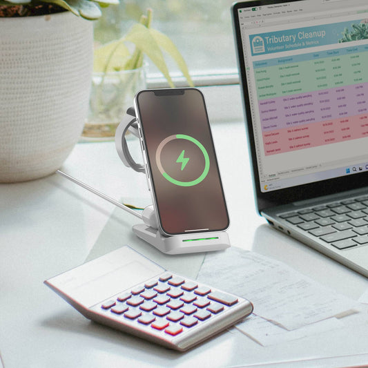 LAX Gadgets 3-in-1 wireless charging station in white with smartphone displaying green charging indicator on desk setup