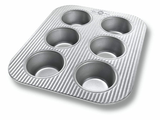USA Pan 6-cup muffin pan with gray nonstick finish and ribbed exterior