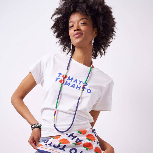 INK + ALLOY Allie Seed Bead Long Necklace in navy and multicolor worn long over white graphic tee