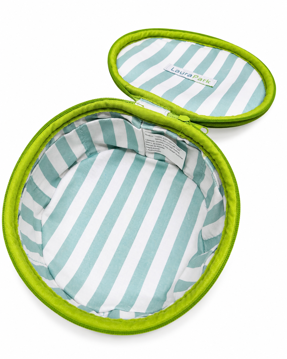 The Laura Park Rosemary Stripe Blue Jewelry Case by Laura Park Designs features an open oval green exterior and a striped light blue and white interior lining. The inside lid displays a "Laura Park" label, with a care tag visible inside the empty case.