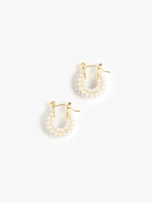 Marrin Costello Audrey Huggies in pearl with gold-tone posts, shown as a pair