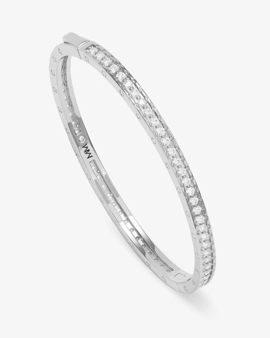 Melinda Maria Ashley Pave Cuff in silver with hinged closure, worn at angle