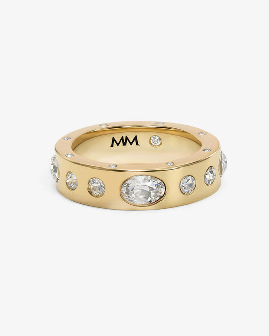 Melinda Maria Ashley Sunset Ring with gold band and white oval and round diamond accents, top view