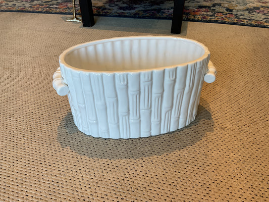 Two's Company white ceramic bamboo pattern holder with small handles on neutral background