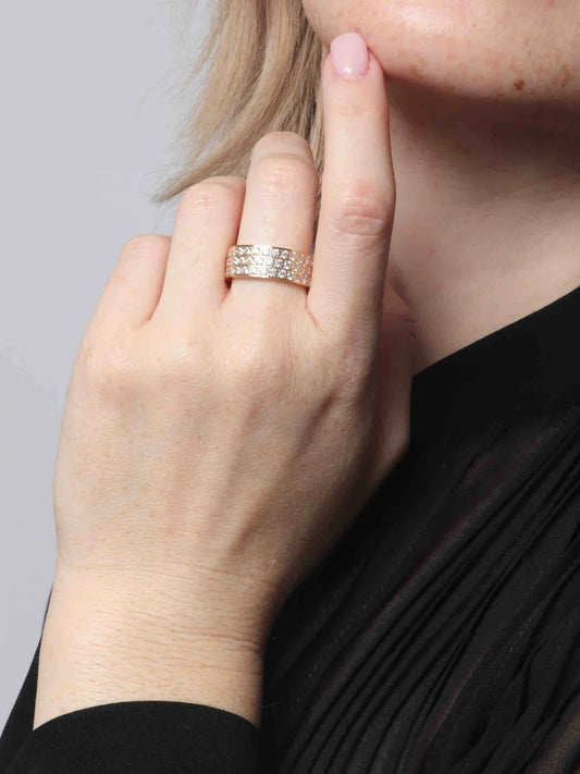 Marrin Costello Biggie Ring pave worn on finger, wide gold band with crystals
