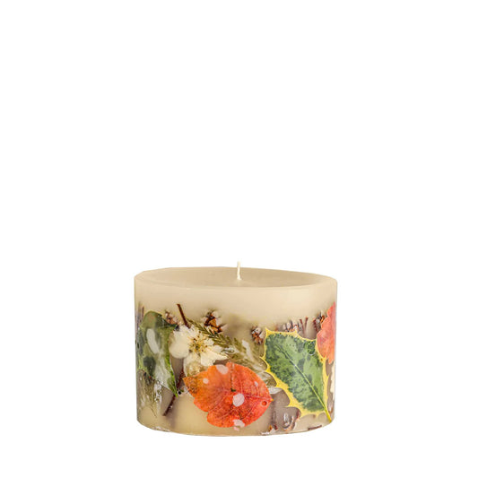 Rosy Rings Petite Botanical Candle in cream with pressed orange flowers and green leaves