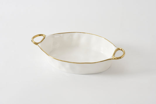 Pampa Bay 13" x 9" Oval Baking Dish in cream with gold handles and trim