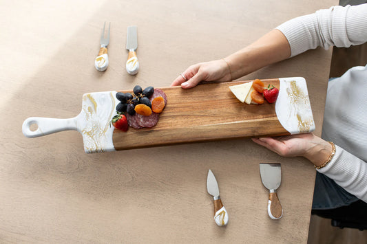Lynn & Liana Baguette Acacia Board with white resin handles, styled with charcuterie and spreaders