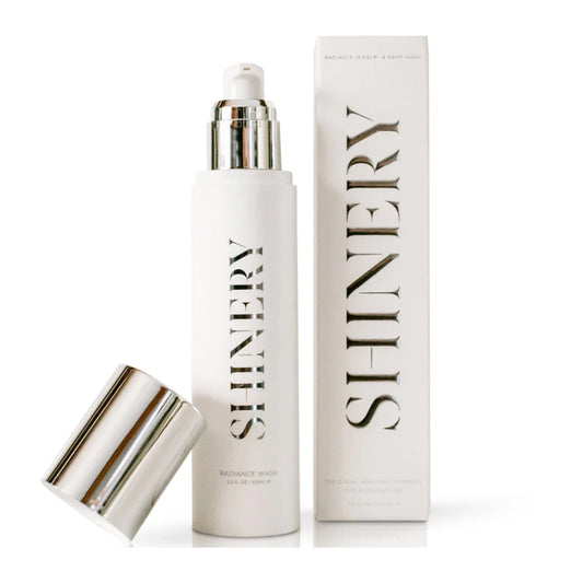Shinery Luxury Jewelry Cleaner 3 fl oz white bottle with gold-accented pump and matching white box packaging