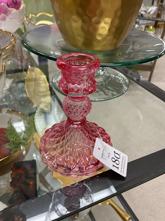 180° Degrees pink textured glass candle holder with geometric cut pattern and brass base on glass shelf display
