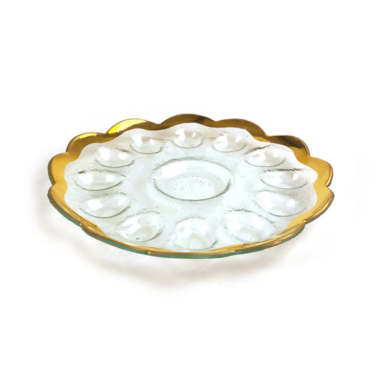 Annieglass Roman Antique Deviled Egg Platter in clear glass with gold scalloped edge and twelve egg cups