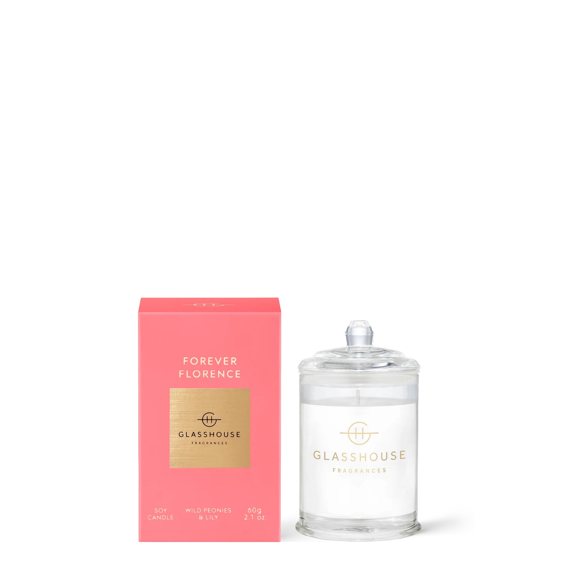 Glasshouse Forever Florence 2.1oz candle in clear glass jar with coral pink box packaging
