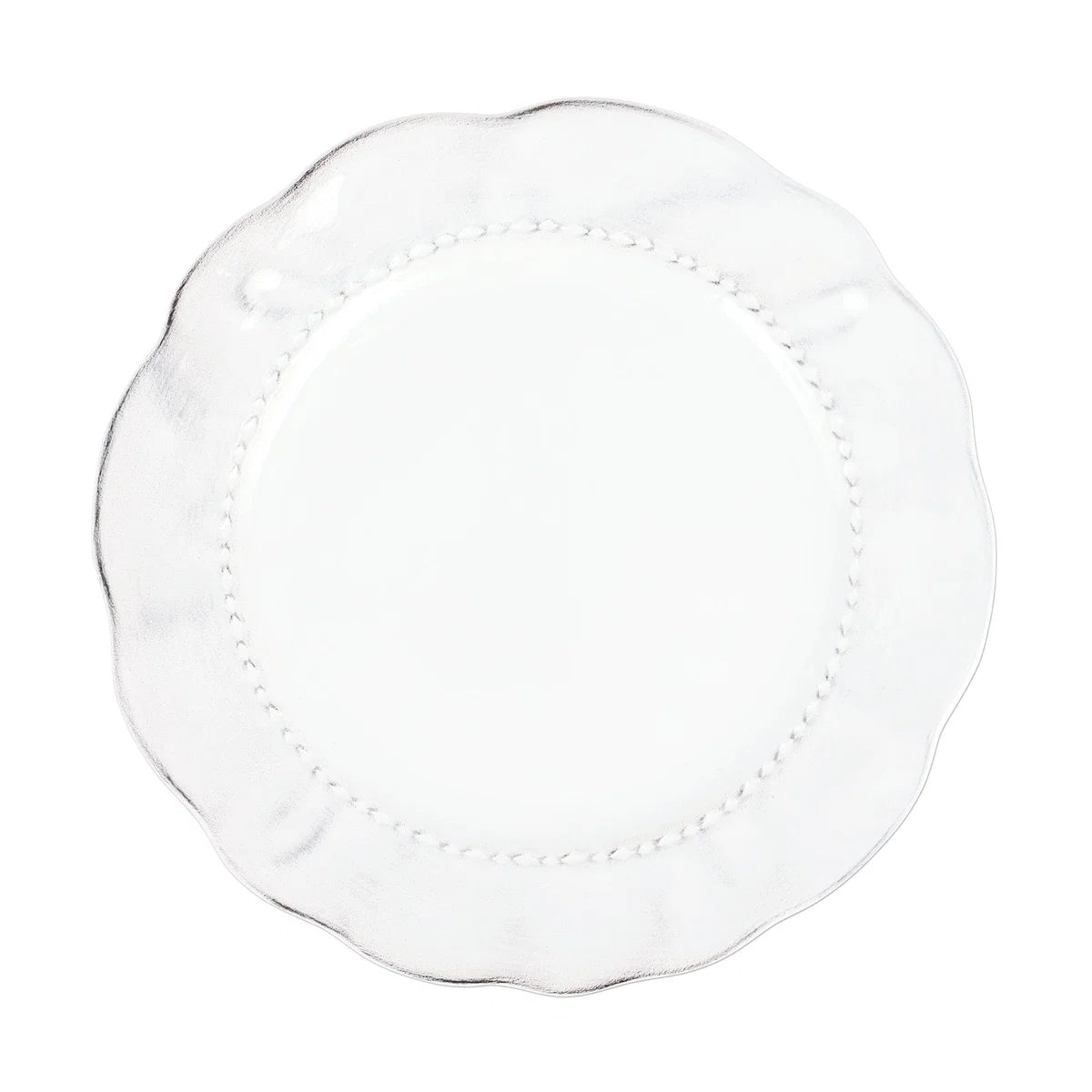 The Vietri “Giorno - Ash” Dinner Plate by Vietri is a white, round plate featuring a scalloped, wavy edge and a subtle beaded design around the inner rim, photographed from above on a white background.