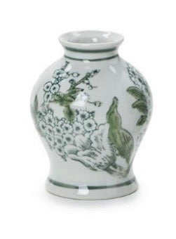 The Two's Company Green and White Chinoiserie Vase by Two's Company features a small, white ceramic form adorned with intricate green floral and bird motifs. Its round body and narrow neck showcase hand-painted details inspired by classic mini vases, making it a timeless décor accent against any plain white background.