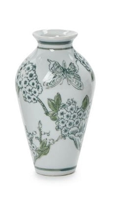 The Two's Company Green and White Chinoiserie Vase by Two's Company showcases green floral and butterfly motifs on white ceramic, with a narrow neck and rounded shoulders reminiscent of classic porcelain chinoiserie vases, displayed on a plain white background.