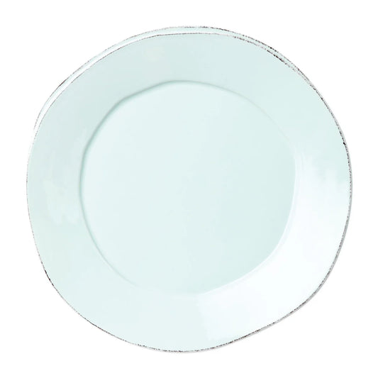 Introducing the Vietri Costa Nova “Lastra - Aqua” Dinner Plate—a round, light blue ceramic plate featuring a slightly uneven, organic silhouette and a thin, distressed darker rim, beautifully displayed against a white background.