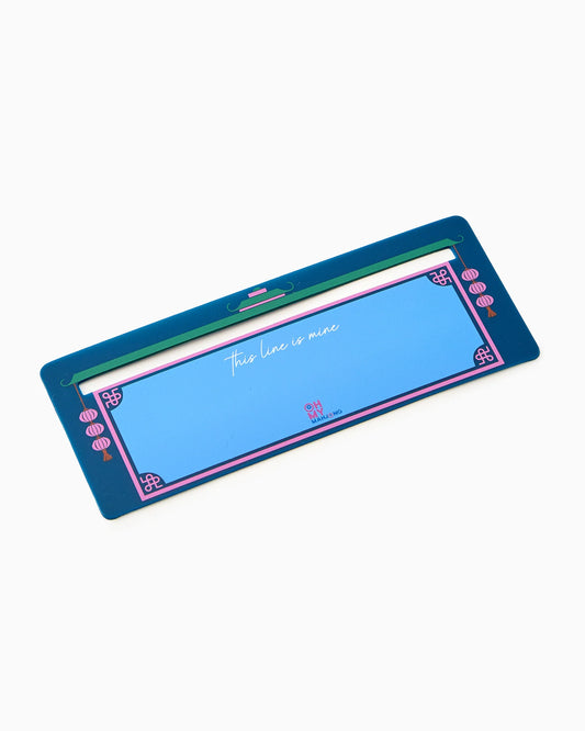 Oh My Mahjong navy blue line finder with light blue mahjong surface and pink accents