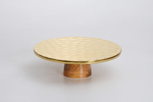 Pampa Bay cake stand with hammered gold top and wooden pedestal base