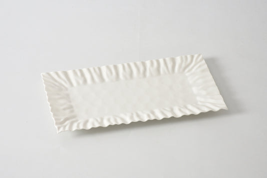 Pampa Bay rectangular tray in cream with scalloped edges, angled view