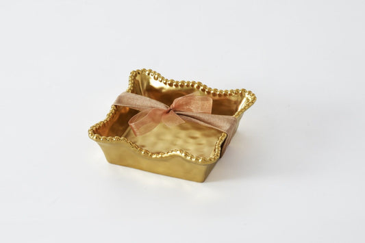 Pampa Bay gold beverage napkin holder with scalloped edges and pink ribbon bow