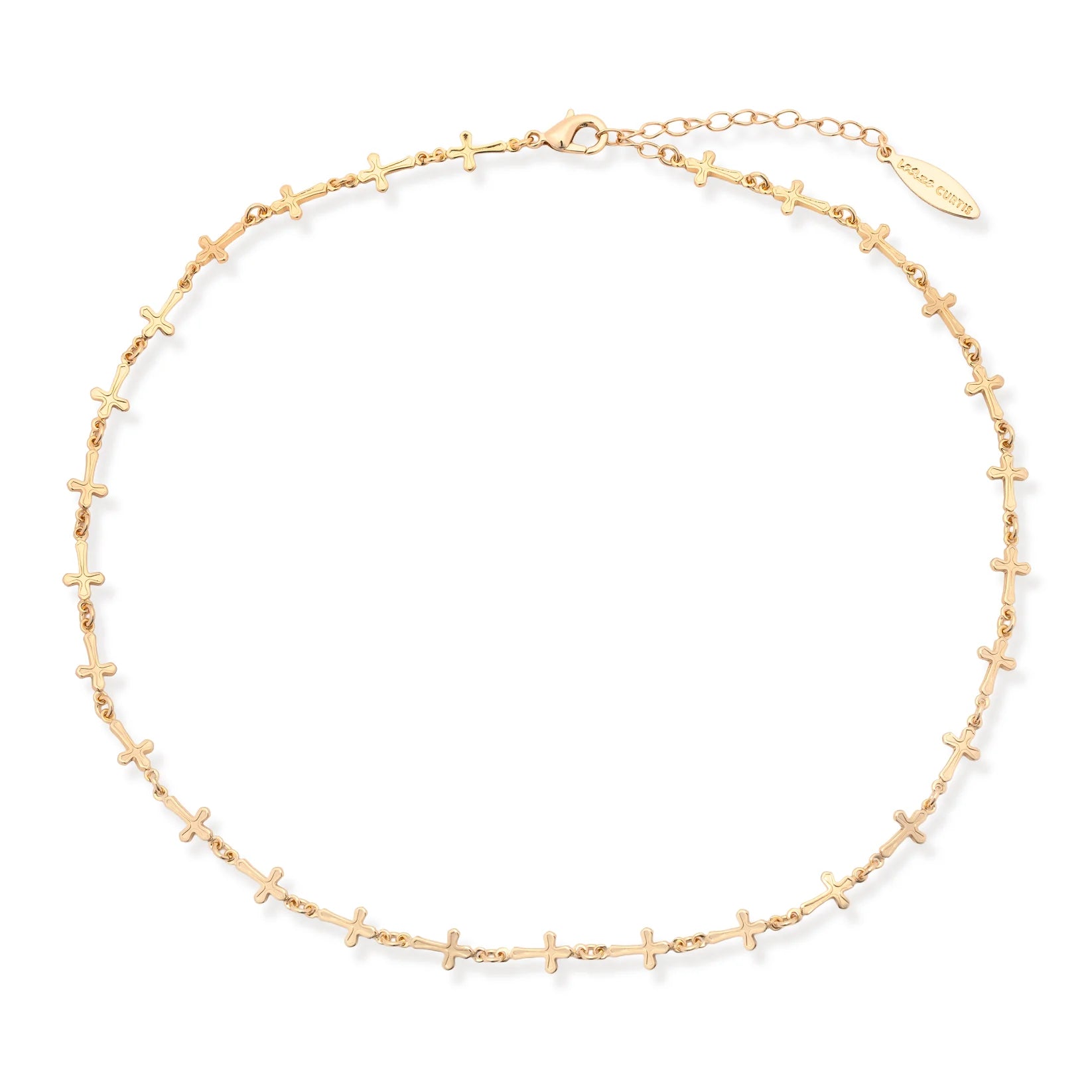 The Leslie Curtis McKay Necklace by Leslie Curtis is a delicate and minimalist layering piece featuring small, evenly spaced cross-shaped charms along a 16-inch chain. It includes an adjustable clasp and a branded tag, making it perfect for creating a subtle, elegant cross layering necklace look.