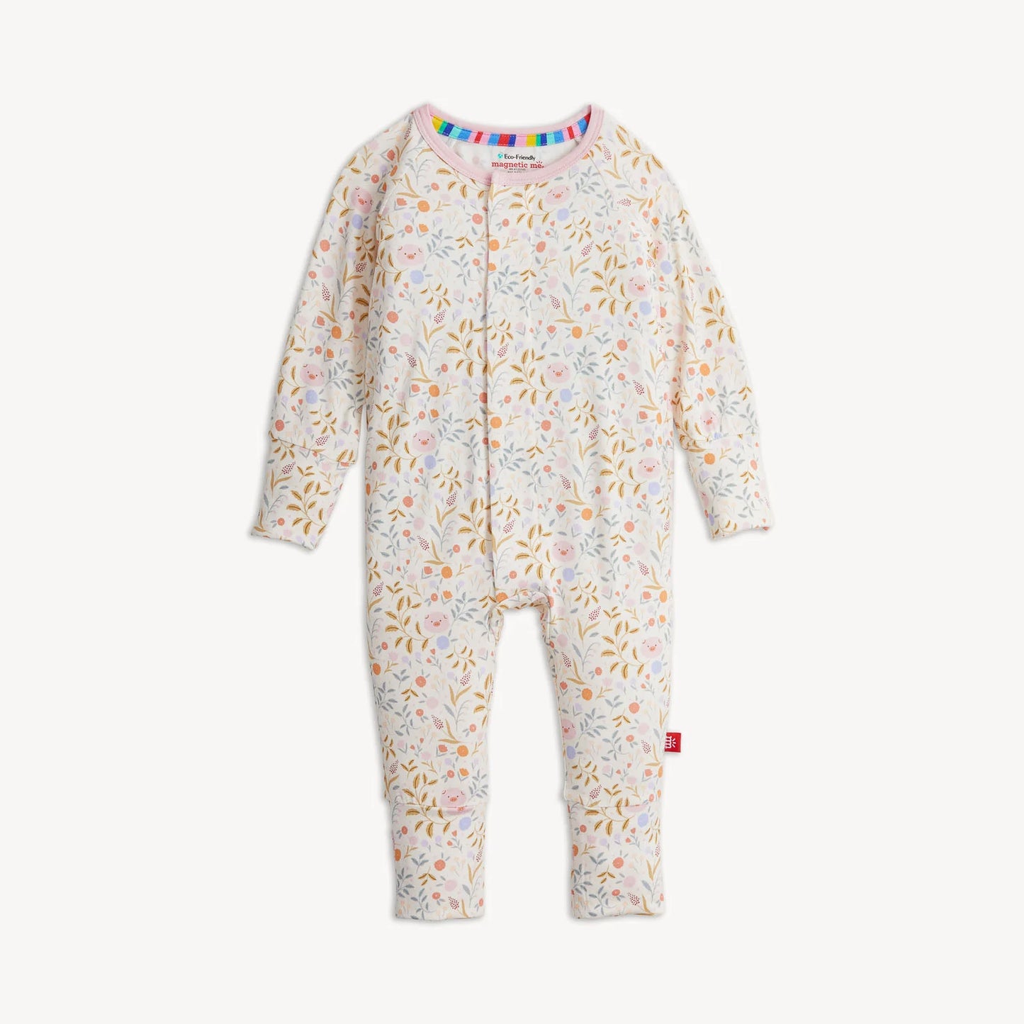 The Magnetic Me "Oinklet" Convertible Coverall by Magnetic Me features long sleeves and convenient snap buttons. Set against a white background, it showcases a vibrant floral pattern and is crafted from sustainable modal fabric. A multicolored striped trim at the collar adds an extra pop of color.