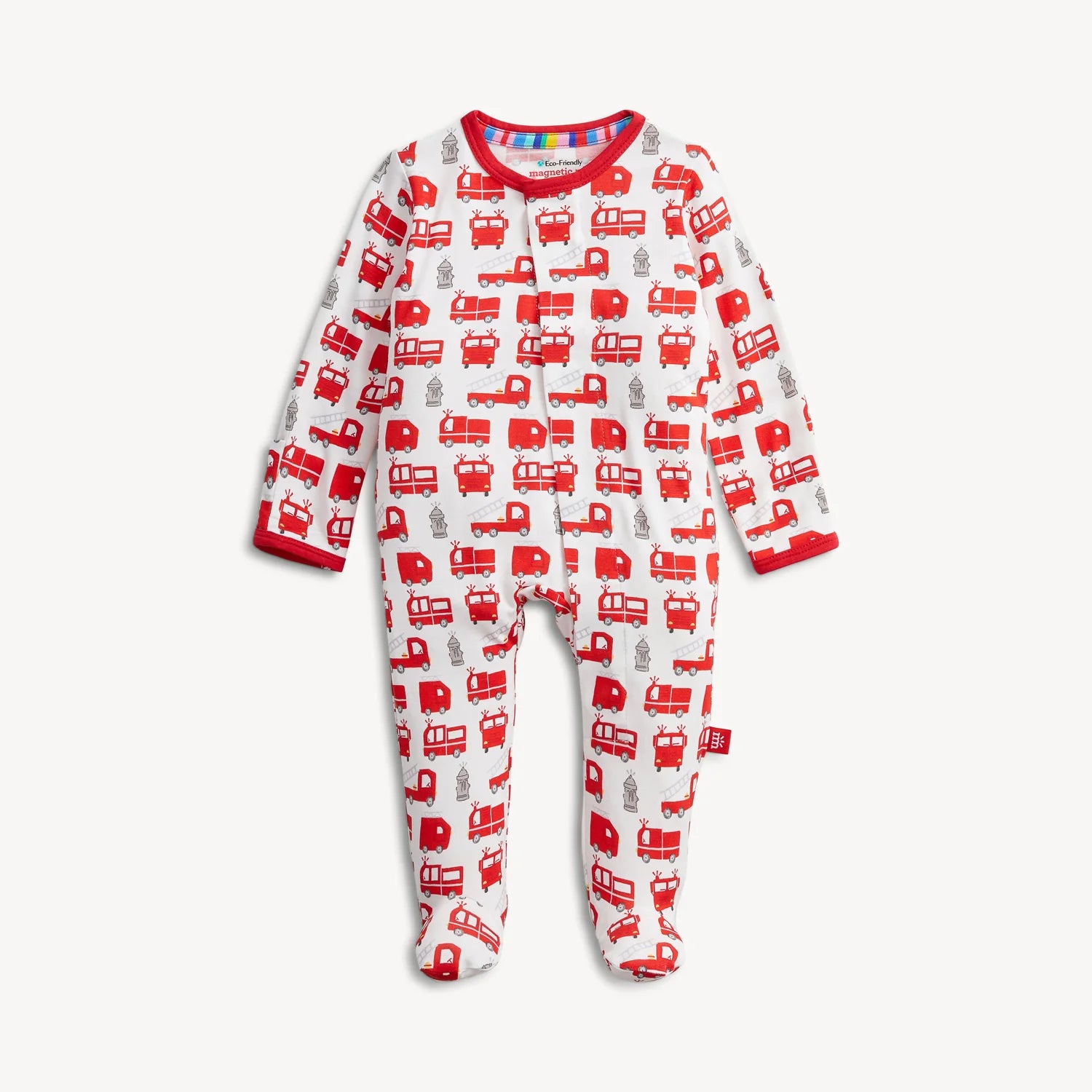 The Magnetic Me "Fired Up" Footie by Magnetic Me is a long-sleeve baby onesie adorned with red fire trucks, fire hydrants, and firefighters on a white background. It features convenient magnetic closures and has red trim around the collar and wrists.