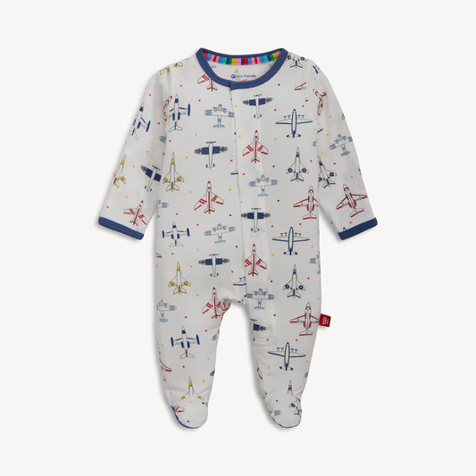 Magnetic Me Just Plane Fun in cream with navy, red, and yellow airplane print, full front view with footed design