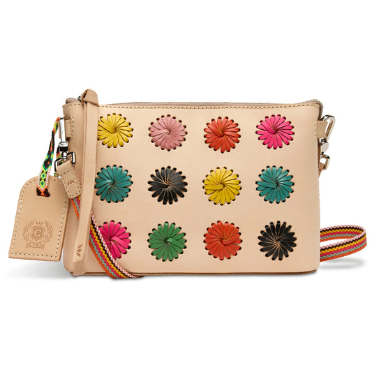 Consuela Midtown Crossbody Paloma in cream with multicolor daisy print and rainbow strap