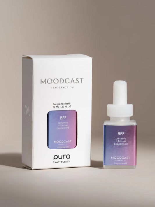 Moodcast BFF fragrance refill bottle with gradient purple-pink label next to white box packaging