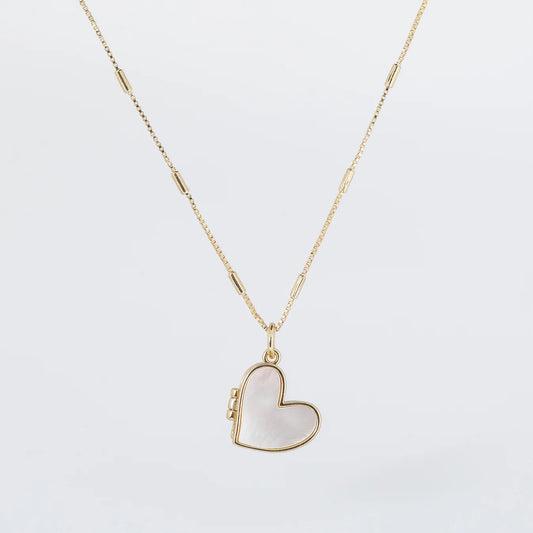 Coastal Grit Mother of Pearl Heart Locket on delicate gold chain with decorative links