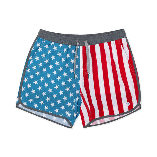 Burlebo swim trunk with blue star pattern on left side and red/white stripe on right side, gray waistband