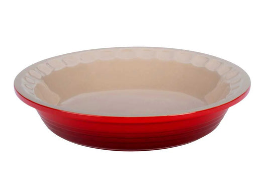 Le Creuset 9-inch pie dish in cherry red enameled cast iron with cream interior