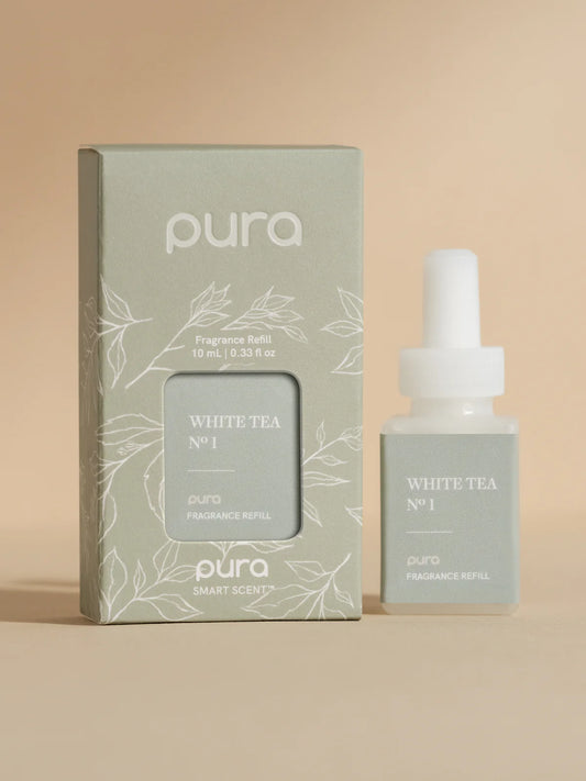 Pura White Tea No. 1 fragrance refill in sage green box with leaf pattern and matching bottle with white pump