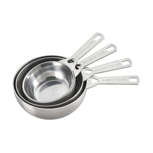 Le Creuset Batch Baking stainless steel measuring cups with handles, nested