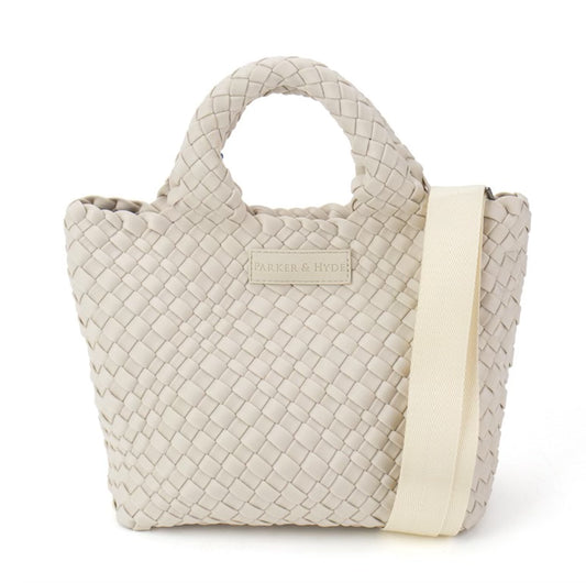 Parker and Hyde Woven Mini Tote in bone with quilted basket weave pattern and cream shoulder strap