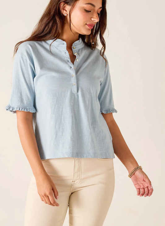 Mersea Josephine Ruffle Henley Tee in light blue with ruffled short sleeves and button placket