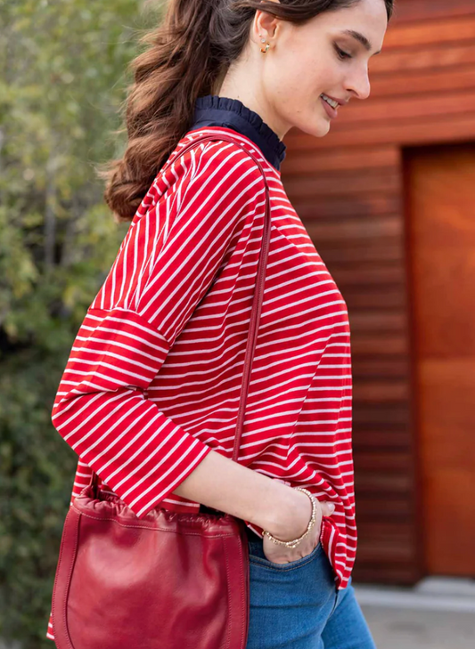 Mersea red and white striped quarter-length sleeve top with navy collar, side view