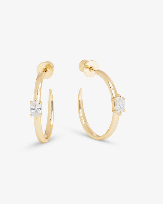 Melinda Maria She's On Point gold hoop earrings with cushion-cut diamond accents