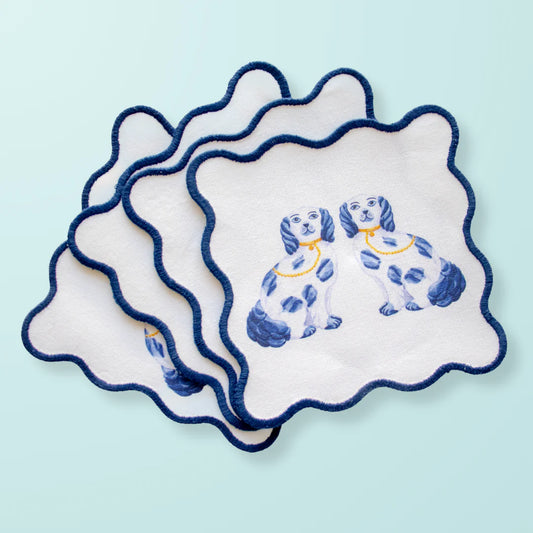 Taylor Paladino Staffordshire Dogs Cocktail Squares with navy scalloped edges and blue-and-white porcelain dog design